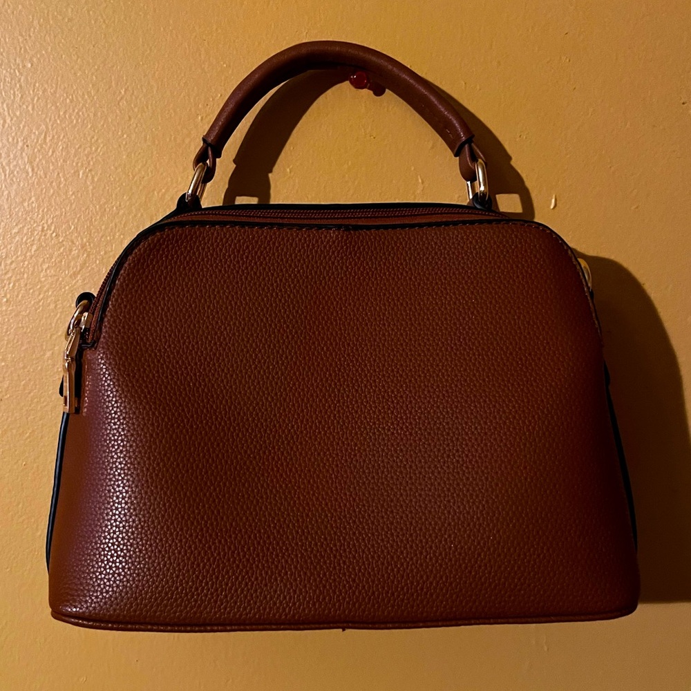 Vegan leather hand bag. Never used !